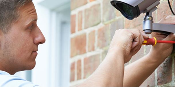 technician working on a camera